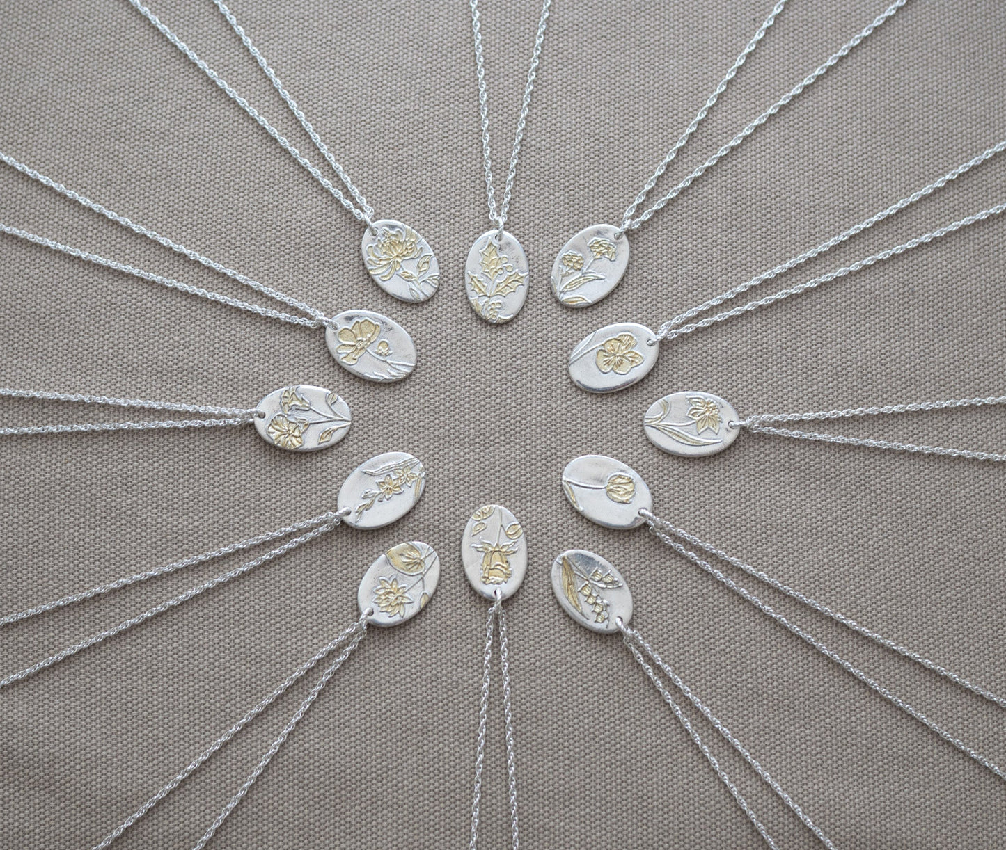 12 birthflower pendants
