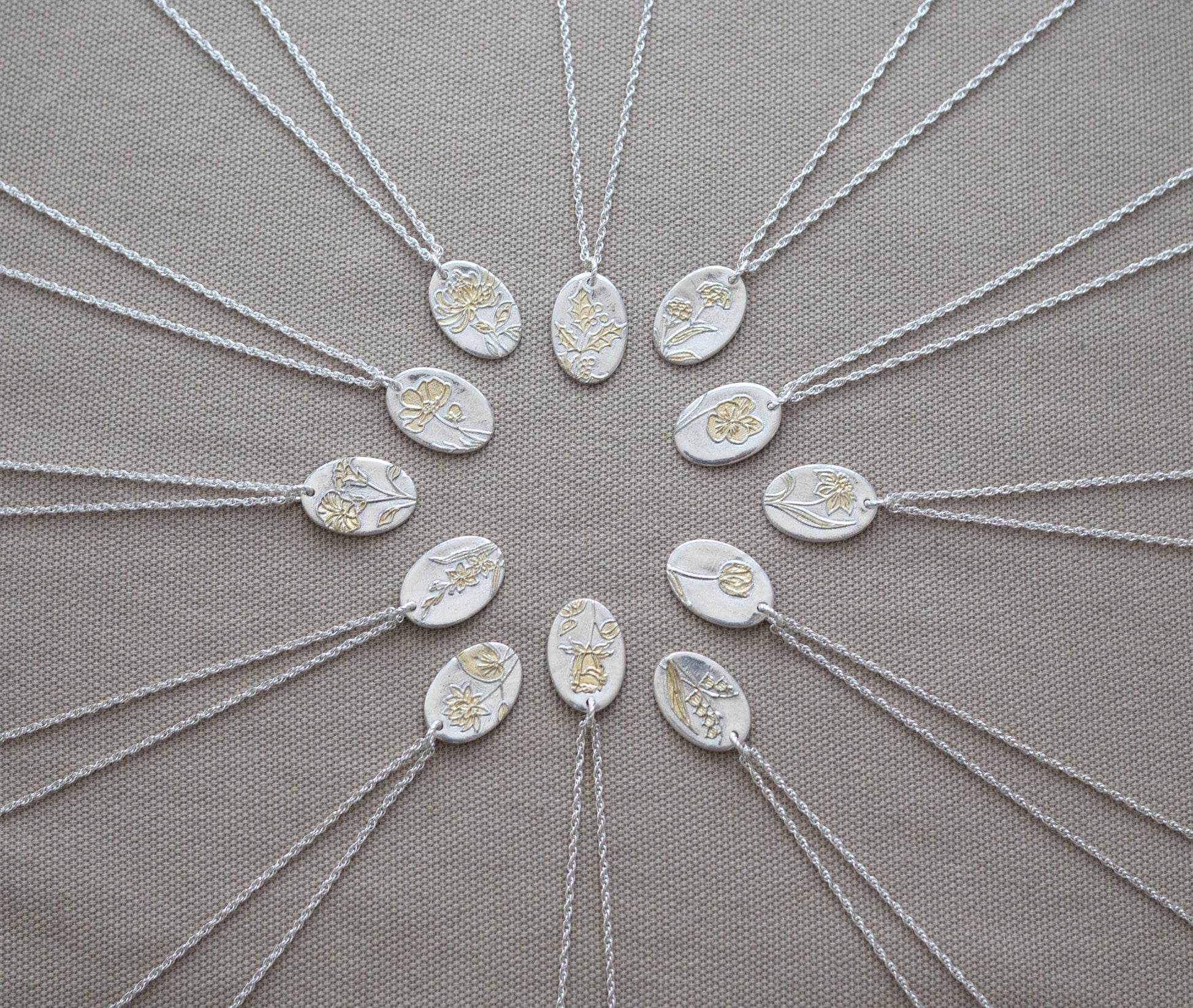 12 birthflower pendants