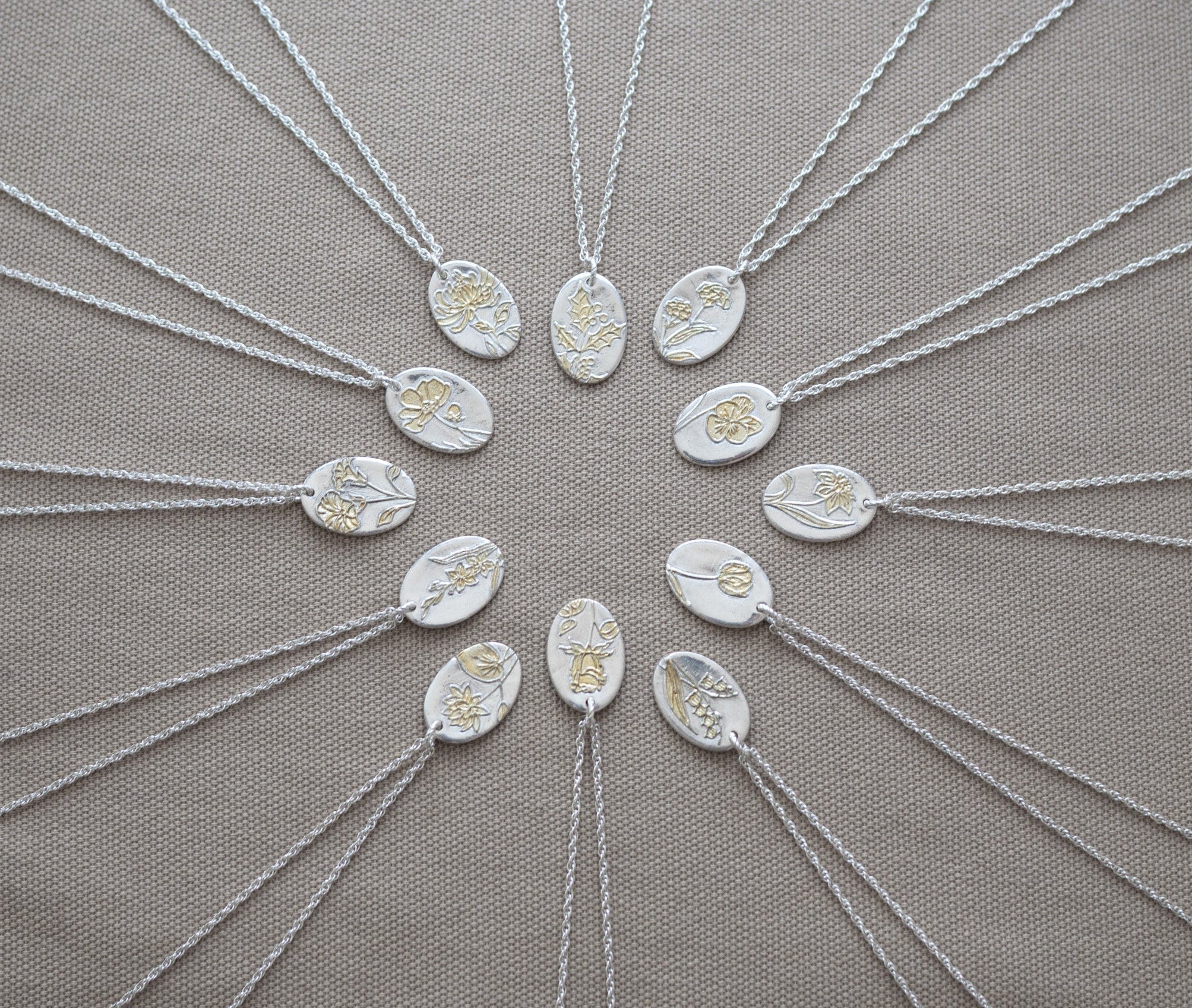 12 birthflower pendants